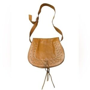 Violetta Cognac Pebbled Leather Lace Up Whipstitch Crossbody Saddle Bag Brown